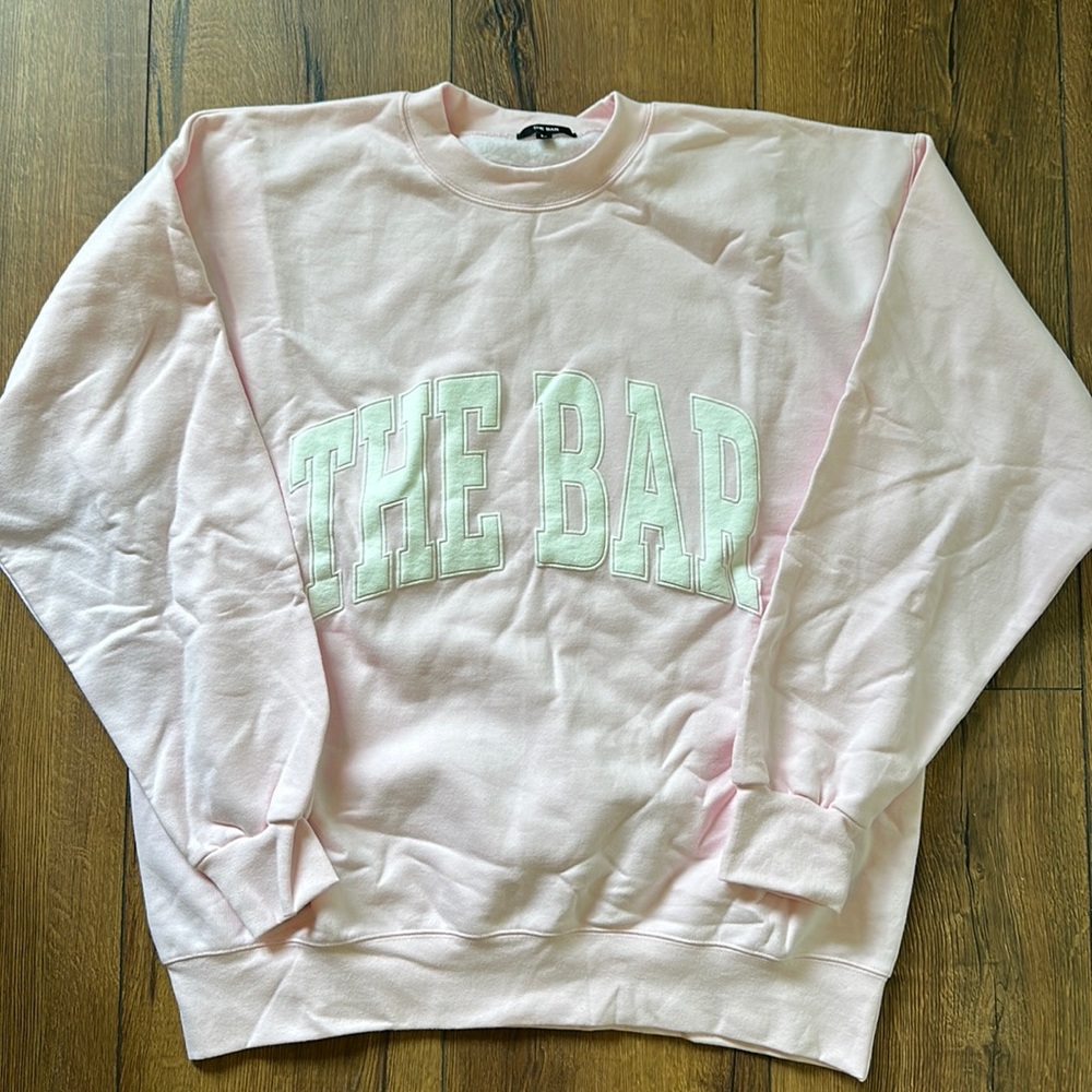Brand new Women’s The Bar oversized sweatshirt.